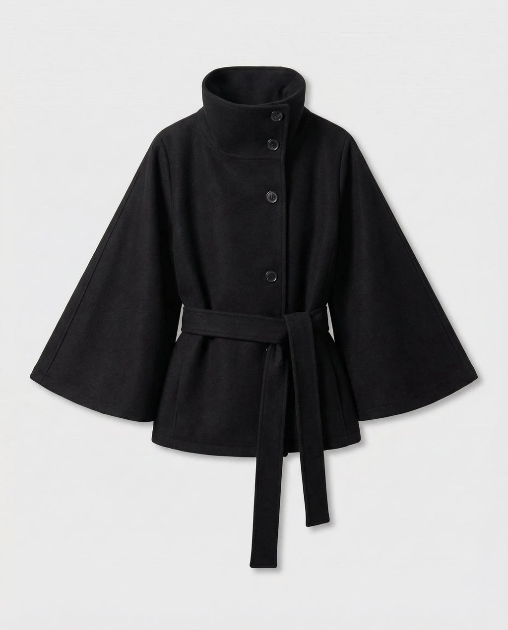 Product shot of the black belted cape jacket laid flat, showing button stand collar and wide bell sleeves