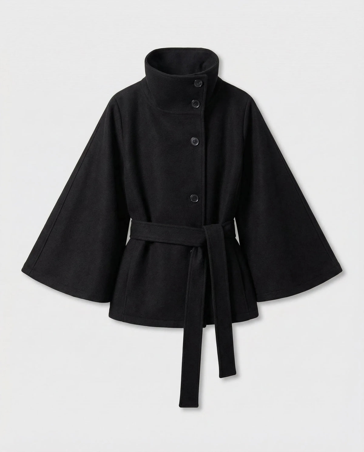 Product shot of the black belted cape jacket laid flat, showing button stand collar and wide bell sleeves