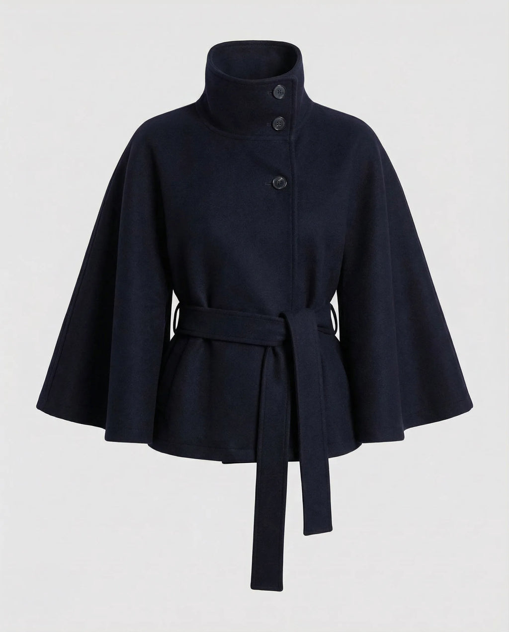 Navy blue belted cape jacket laid flat, showing the button-through collar and swing silhouette