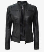 Front view of a black lambskin leather biker jacket, unzipped, showing the quilted shoulder panels and twin chest zip pockets