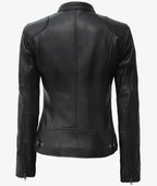 Back view of the black leather biker jacket showing the fitted waist tabs, seam detailing and zipped cuffs