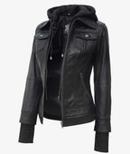 Front view of black leather bomber jacket with hood down, showing zip closure and chest pockets