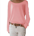 Pink loose-fit jumper with wide boat neckline, long sleeves and turned-back cuffs, paired with white trousers and a belt