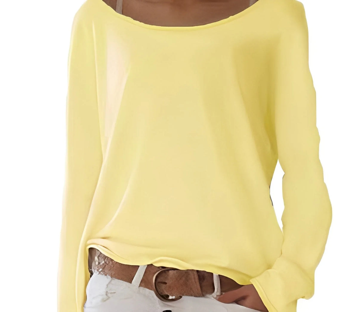 Close-up of pale yellow boat neck jumper showing the soft fabric texture and relaxed long sleeve fit