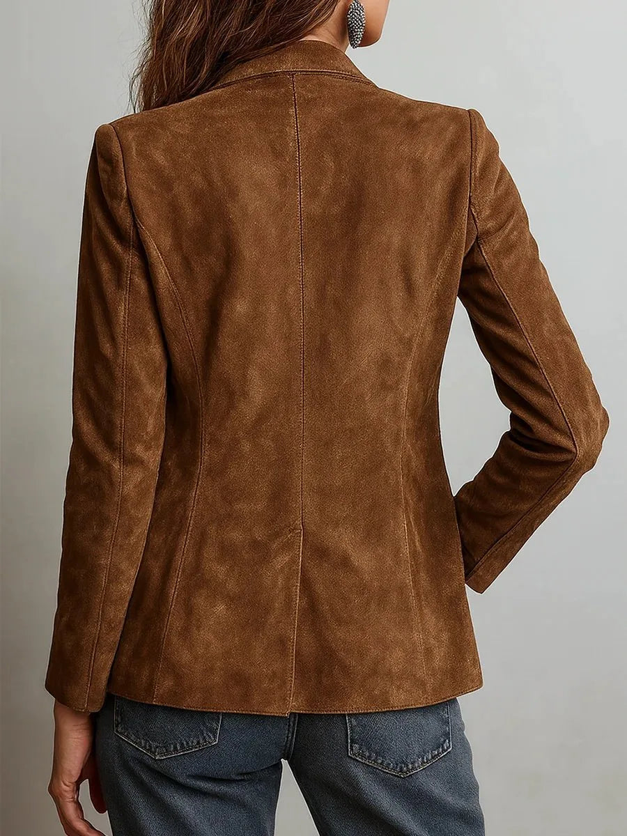 Back view showing the tailored fit and structured shoulders of the brown suede jacket