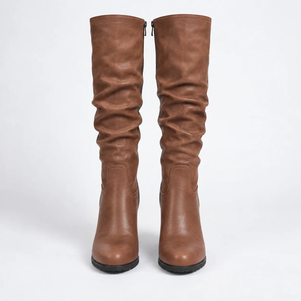 Front view of both boots side by side showing the ruched leather shaft, back zip and round toe shape.