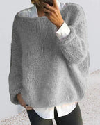 Grey chunky mohair-style knit jumper shown from the front, layered over a crisp white collared shirt