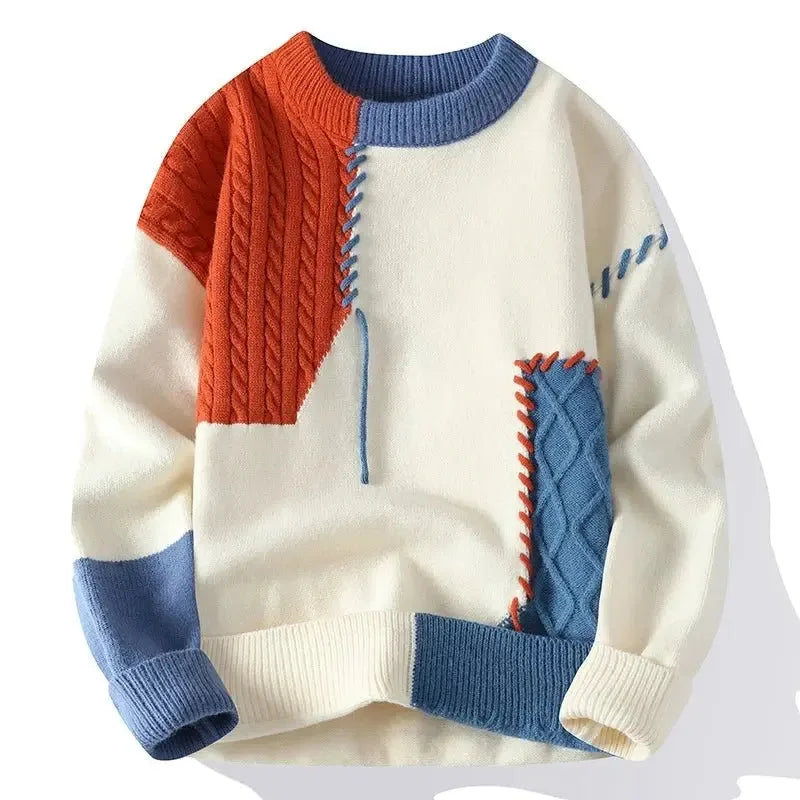 Orange and cream cable-knit jumper with blue colour block panel and contrast stitching, front view