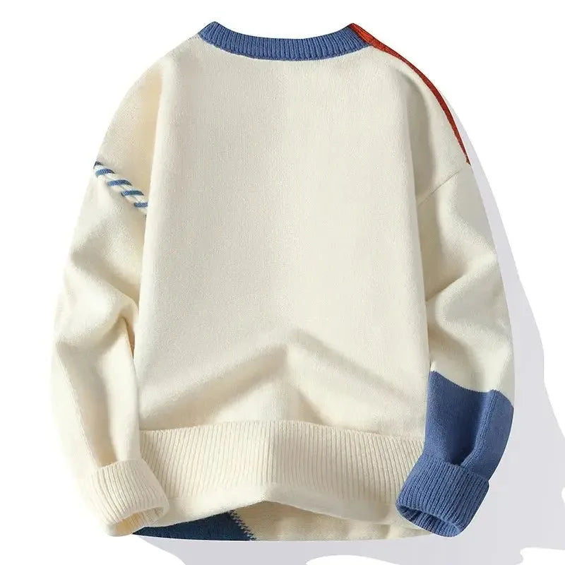 Back view of cream jumper showing blue and orange sleeve panels and ribbed hem