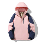 Pink and navy colourblock hooded ski jacket laid flat, showing zipped chest pocket and elasticated cuffs