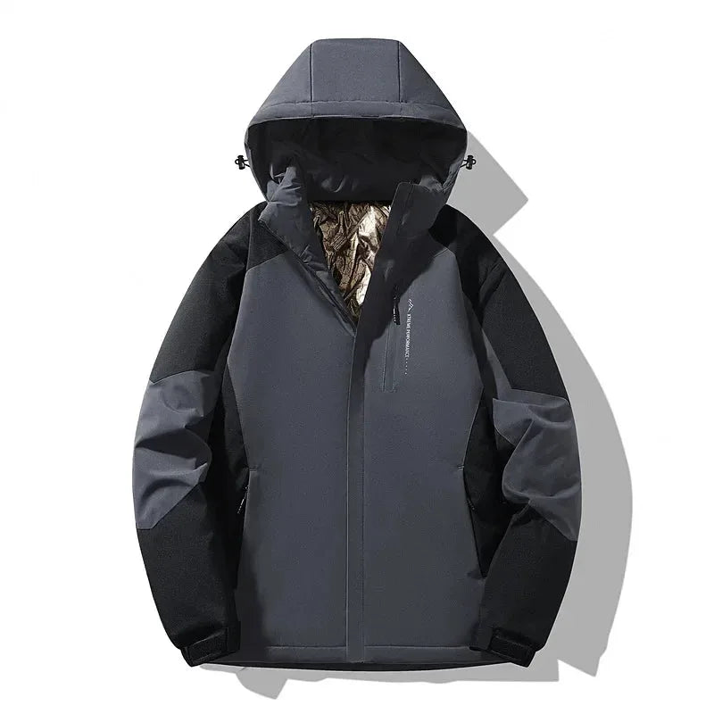 Grey and black colourblock ski jacket with hood, showing textured sleeve panels and dual zip pockets