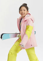 Girl smiling while holding skis, showing the fitted hood and zip chest pocket of the pink jacket