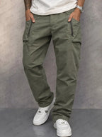 Front view of khaki green cotton cargo trousers with zip pocket detail and relaxed tapered fit