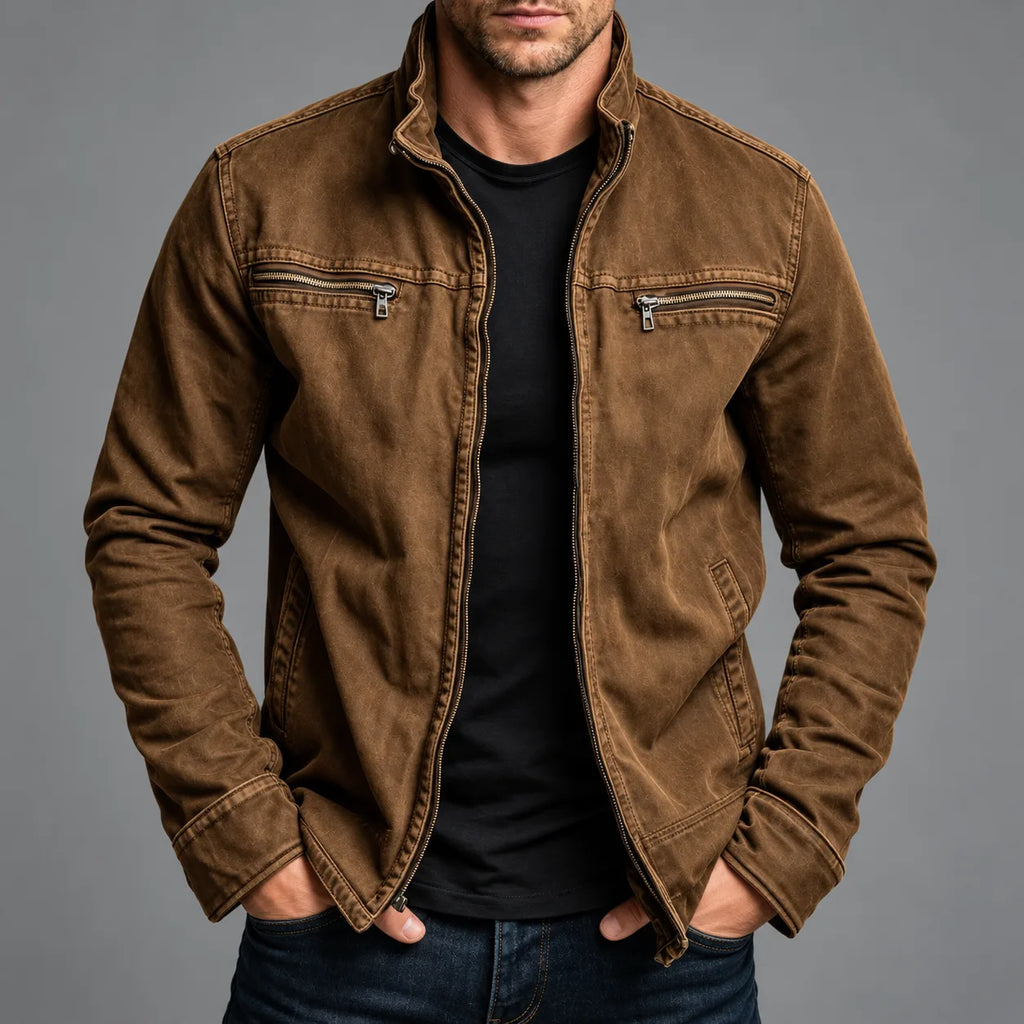 Man wearing a brown washed cotton zip jacket with stand collar, chest zip pockets and side pockets