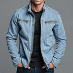 Man wearing a light blue washed denim-look zip jacket with stand collar and twin chest zip pockets