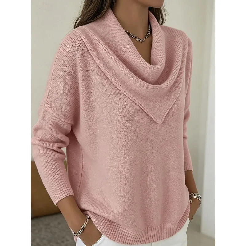 Close-up front view of the pink cowl-neck jumper showing the soft knit texture and relaxed fit