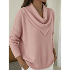 Close-up front view of the pink cowl-neck jumper showing the soft knit texture and relaxed fit
