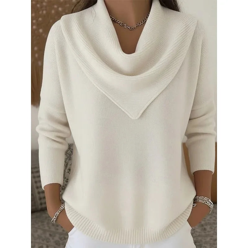 Front view of the jumper in cream white, showing the cowl neckline and relaxed knit fit