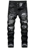 Flat lay front view of dark grey ripped denim trousers with distressed knee and thigh panels