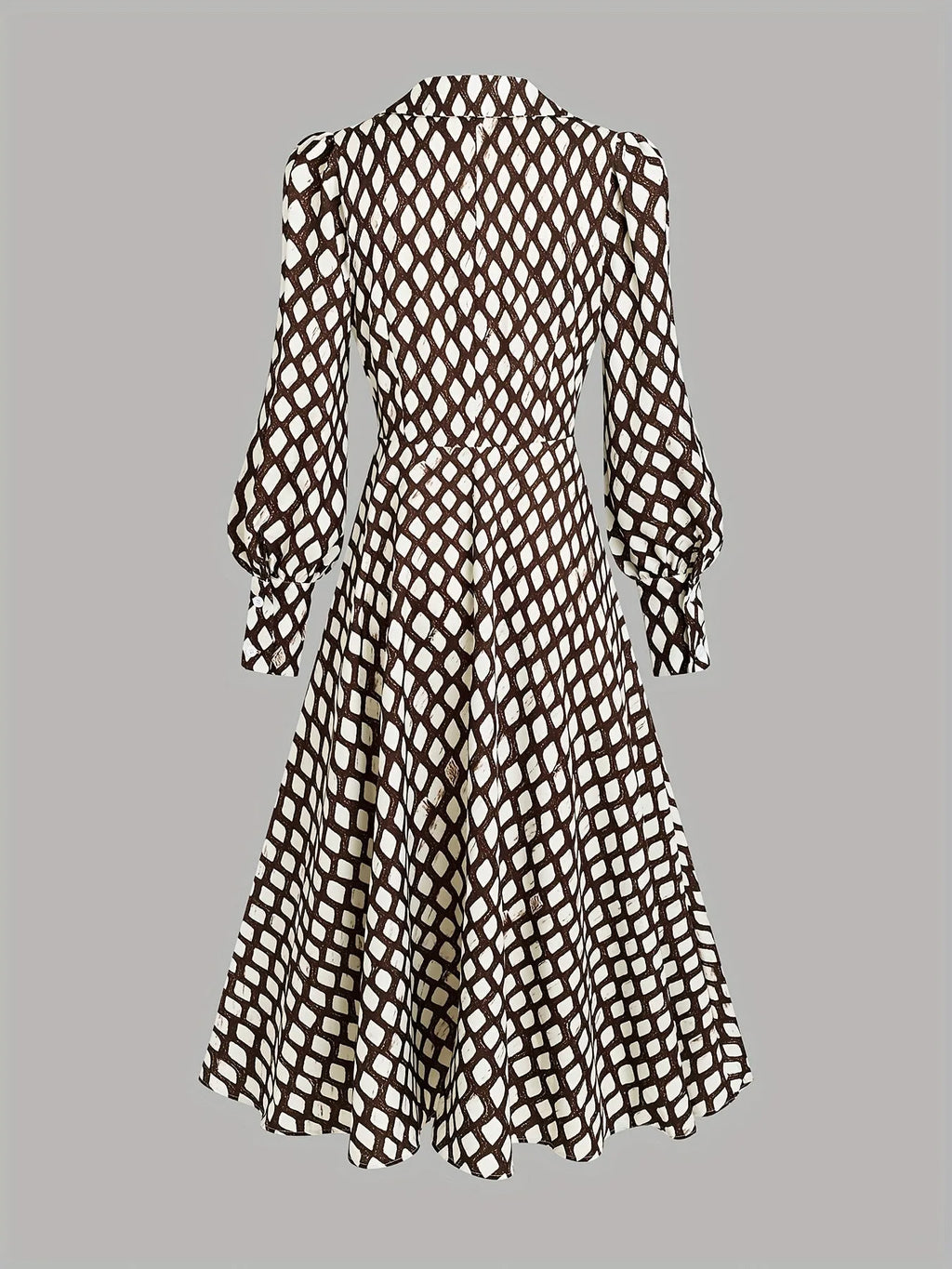 Flat lay back view of the midi dress highlighting the seamed waist and the flowing hemline