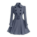 Grey double-breasted skater coat with structured collar, black buttons and buckled belt