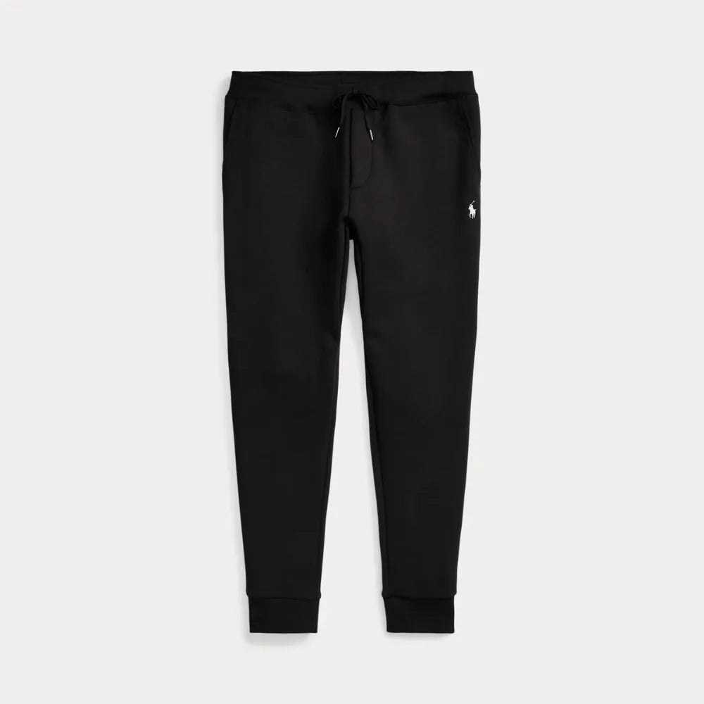 Black double-knit joggers laid flat, showing ribbed cuffs and slanted front pockets