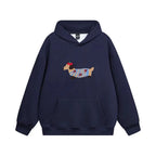 Navy hoodie laid flat, front view, highlighting the dachshund patch against the dark fabric