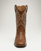 Front view of brown western boot showing matching pull tabs and detailed cream stitching along the shaft