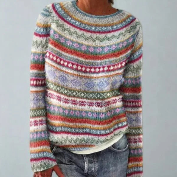 Cream Fair Isle jumper covered edge to edge in red, blue, mustard and pink patterned stripes