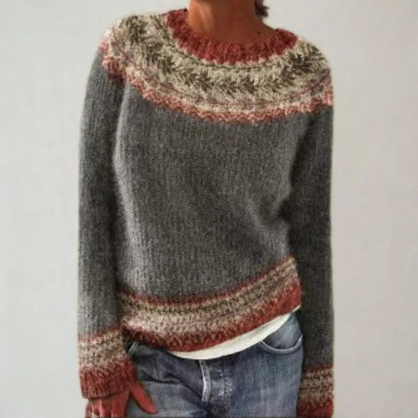 Grey Fair Isle jumper with a rust and cream patterned yoke and matching ribbed cuffs and hem