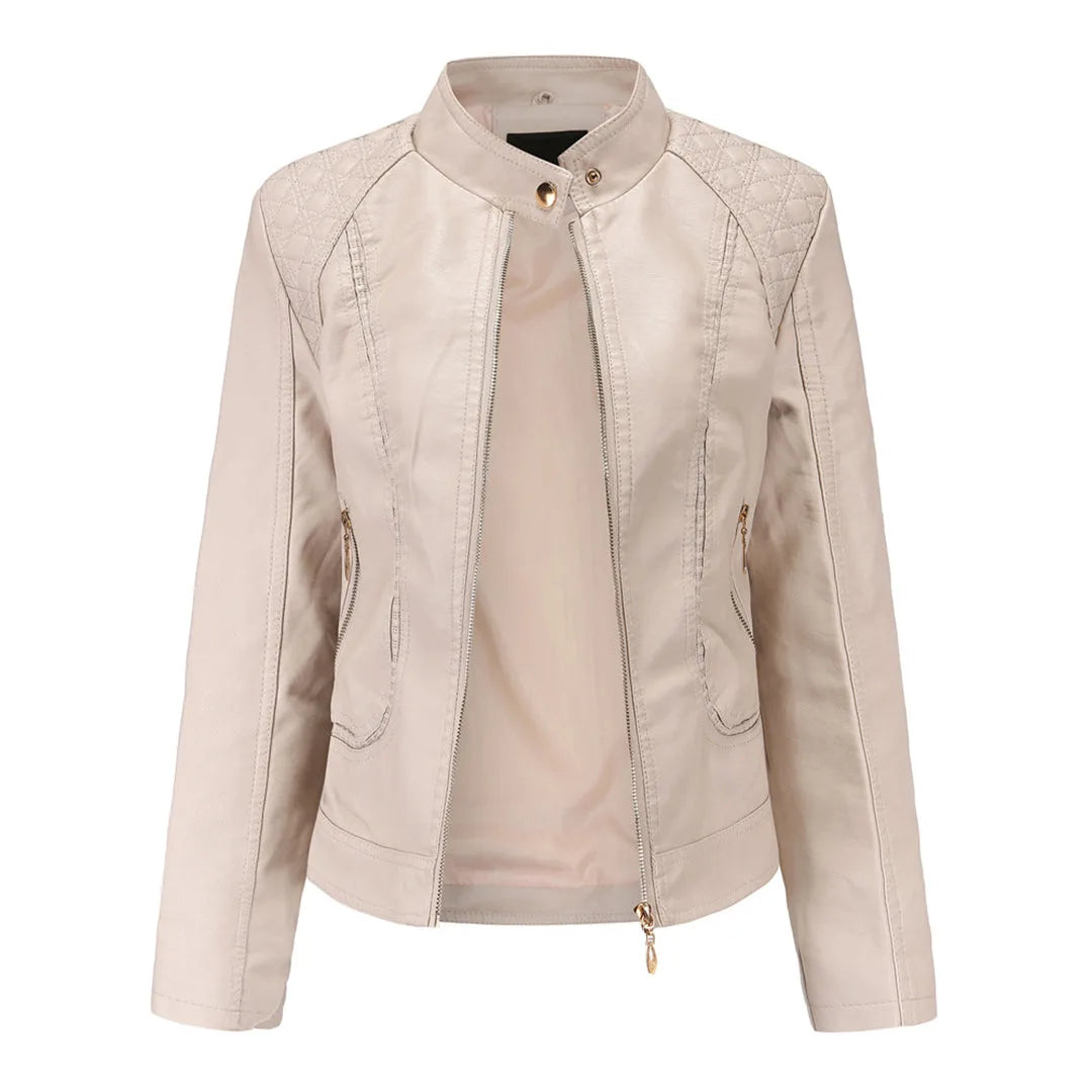Light beige faux leather jacket with stand collar, press-stud neck fastening and quilted shoulder detail, shown open