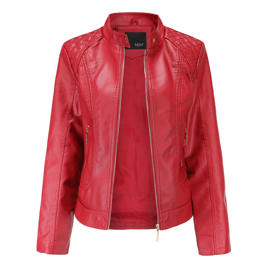 Red faux leather jacket with zip-front closure, quilted shoulder panels and curved hem, displayed against a white background
