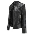 Side angled view of a black faux leather jacket showing the quilted shoulder panel, zip pocket and fitted silhouette