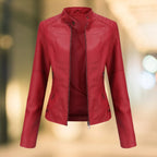 Wine red leather jacket with stand collar and front zip, dual zip pockets visible at the waist