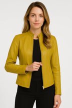 Front view of the jacket in dusty pink with the zip fastened halfway up the collar