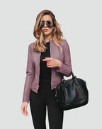 Front view of the jacket in navy blue with a single stud fastening at the collar