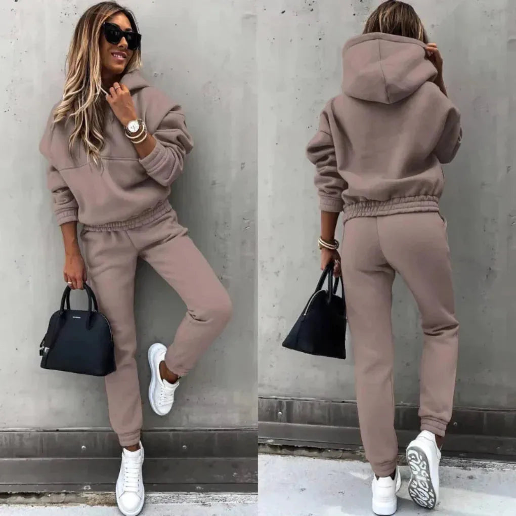 Taupe fleece two-piece tracksuit, front and rear views showing the elastic waist joggers and soft brushed fabric finish