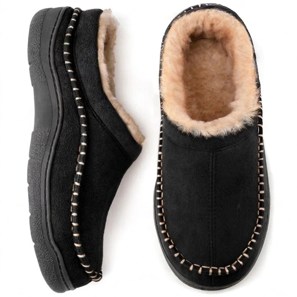 Top and side view of black suede clog slippers with tan fleece lining and ridged black sole
