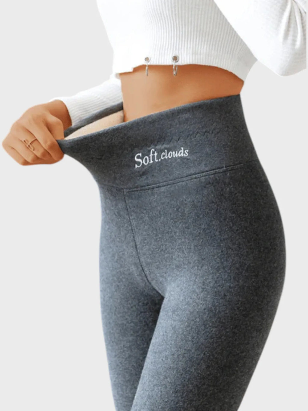 Side view of dark grey thermal leggings with high waistband and embroidered Soft.clouds label