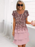 Blush pink sequinned bodice midi dress with tiered ruffle skirt and round neckline, pink chiffon fabric