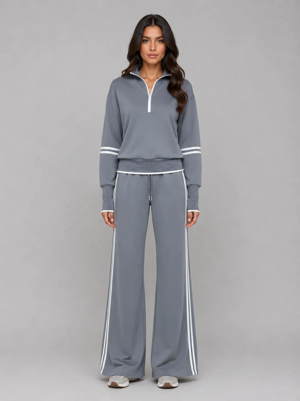 Front view of dark grey half zip lounge sweatshirt and wide leg trousers with white contrast stripes