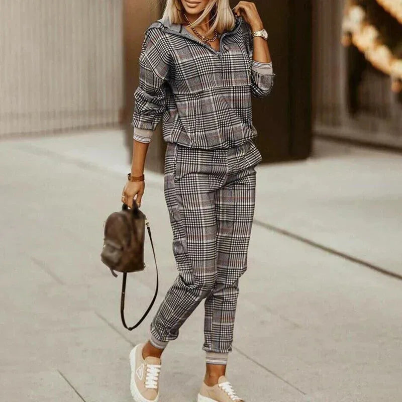 Neutral checked tracksuit set with a half-zip collar top and tapered joggers finished with ribbed cuffs
