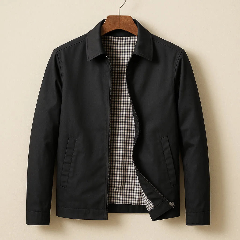 Black harrington jacket on wooden hanger, open front showing black and white checked lining and zip