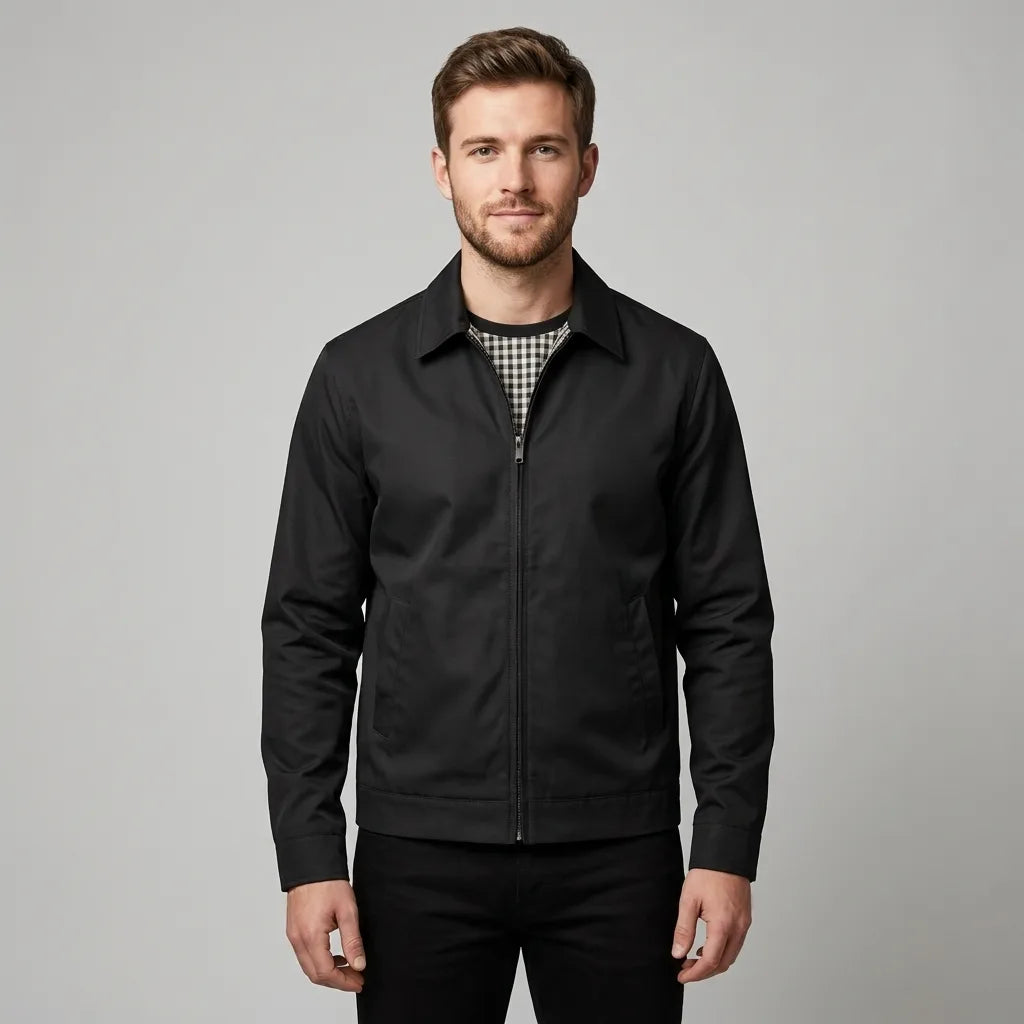 Navy blue harrington jacket laid flat showing full length and checked interior lining