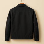 Back view of black harrington jacket showing clean streamlined cut and shoulder seams