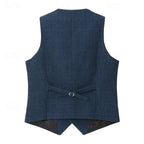 Full back view of the navy herringbone waistcoat laid flat, showing satin lining and adjustable buckle strap