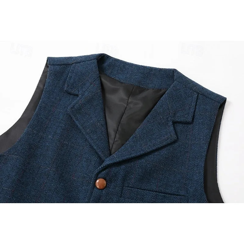 Close-up of the notch lapel collar and top button on the navy herringbone waistcoat
