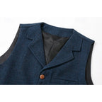 Close-up of the notch lapel collar and top button on the navy herringbone waistcoat