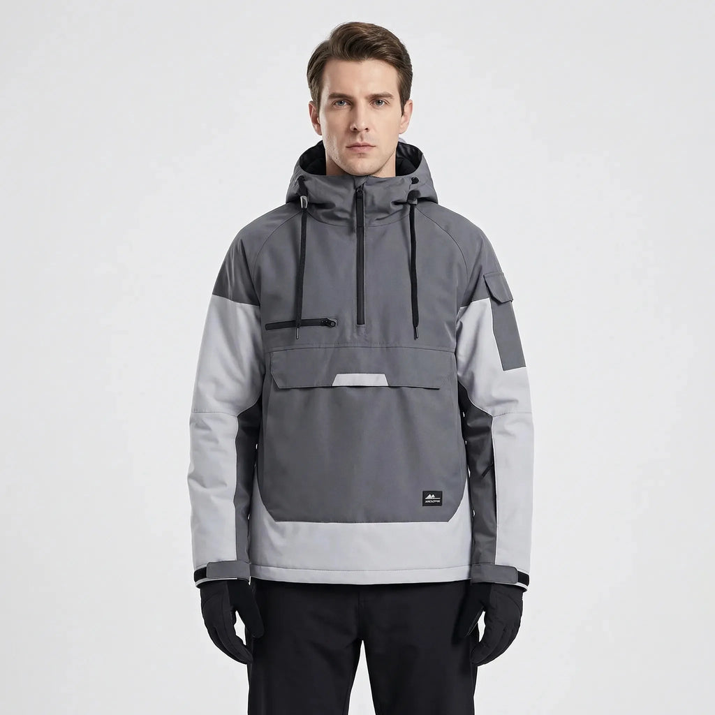 Model wearing the anorak in grey and light grey colourblock, front view showing kangaroo pocket