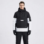 Model wearing the anorak in black and white colourblock, front view with hood down